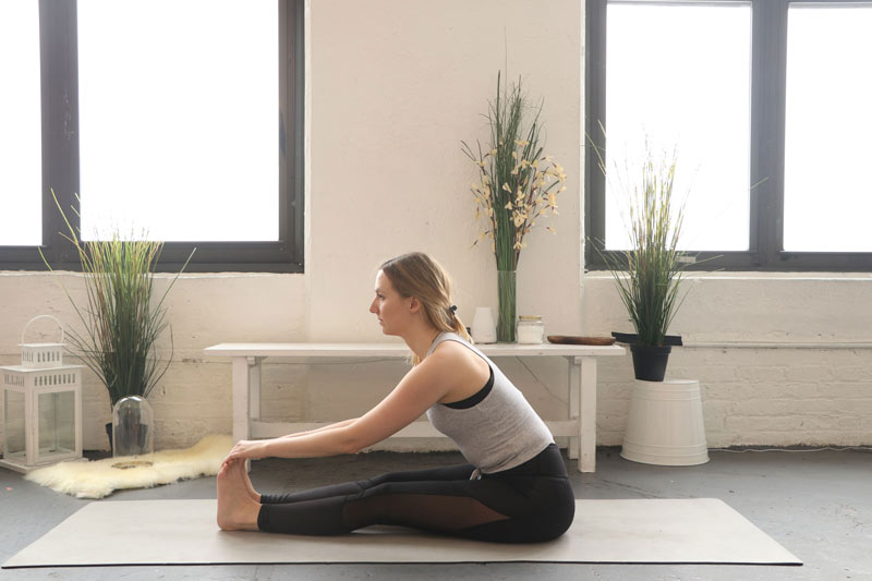 Try Forward Bend for your Travel Yoga Sequence